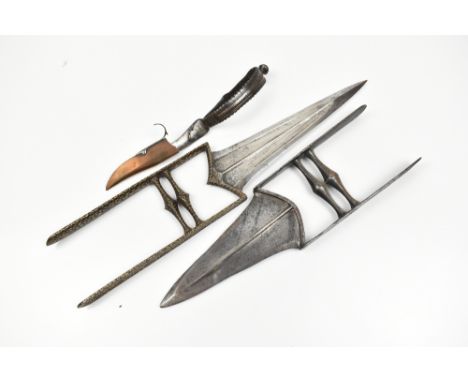 Two Indian katar daggers, one with gilt detail to hilt, length 39cm, and a smaller dagger with shaped blade (3).Additional In