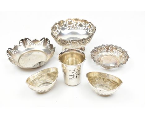 GEORGE NATHAN &amp; RIDLEY HAYES; an Edward VII hallmarked silver cast and pierced foliate motif dish on spreading circular f