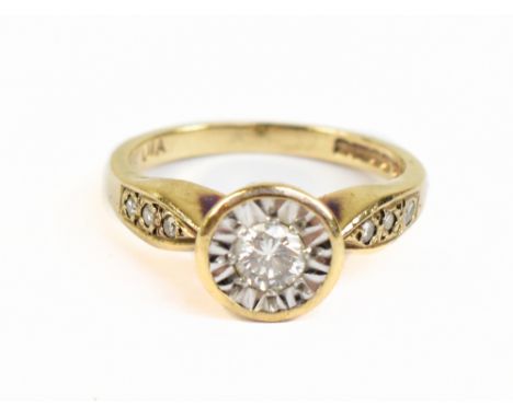 A 9ct yellow gold illusion set diamond solitaire ring, the diamond weighing approx 0.20, size I, approx 2.4g.