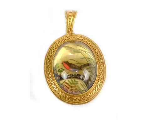 A fine Victorian Essex Crystal intaglio pendant in yellow metal beadwork decorated oval frame and with bead decorated bail, c