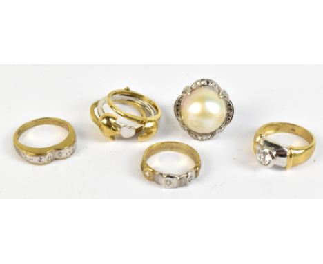 Four 9ct yellow gold dress rings, three set with white coloured stones, and a further dress ring with rubbed marks to interio