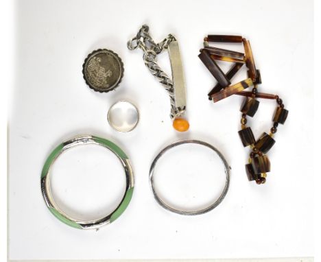 A small mixed group of costume jewellery including silver ID bracelet, hinged bangle, bead necklace, etc.