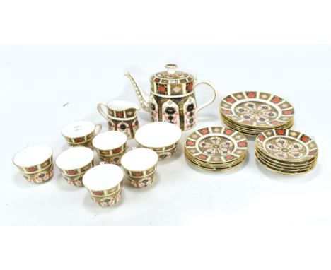 ROYAL CROWN DERBY; a six setting tea service decorated in the 1128 pattern (twenty-seven pieces).Additional InformationAll pi