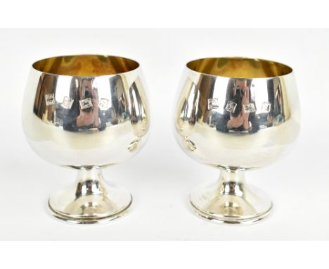 A pair of Elizabeth II hallmarked silver brandy goblets with gilt washed interiors, Birmingham 1973, height 8.25cm, approx 6.