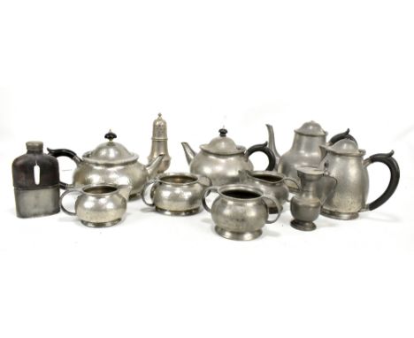 LIBERTY &amp; CO; an English Pewter five piece tea set, a Tudric pewter three piece set, a pewter jug, a silver plated sugar 