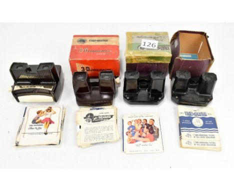 VIEWMASTER; three 3D viewers with twenty-seven reels, one with light box, and a Sawyers Viewmaster with thirteen reels (4).