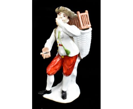 MEISSEN; a mid-18th century figure of a peasant snuff taker, modelled by Kaendler circa 1740, painted scrolling M to base, he