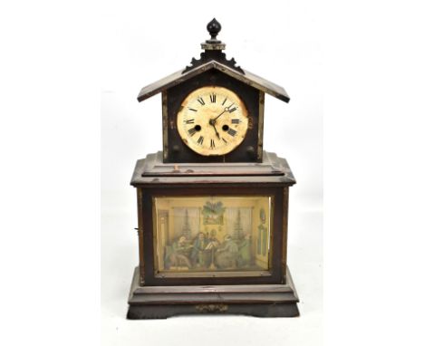 A late 19th century German automaton mantel clock with simple movement, applied paper dial and with case set with a quartet o