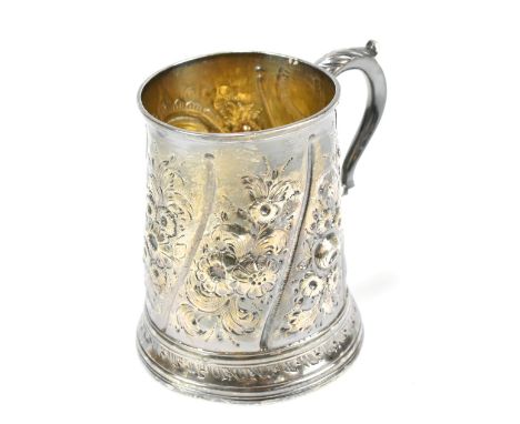 HESTER BATEMAN; a George III hallmarked silver christening mug initialled 'RTC' with repoussé foliate decoration and reeded d