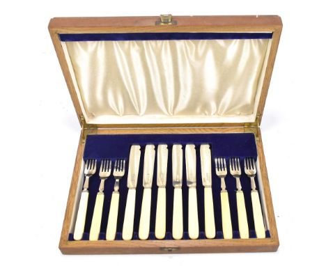 GW SHIRTCLIFFE &amp; SON; a cased George VI hallmarked silver fish set, comprising six knives and forks, with ivory handles, 