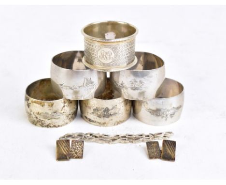 A collection of hallmarked silver and white metal including a napkin ring with engine turned detail, pair of cuff links with 