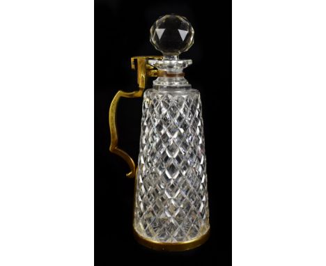 A circular 1900 cut glass locking decanter, height 29.5cm (lacking key).Additional InformationKey not present, chipping to th