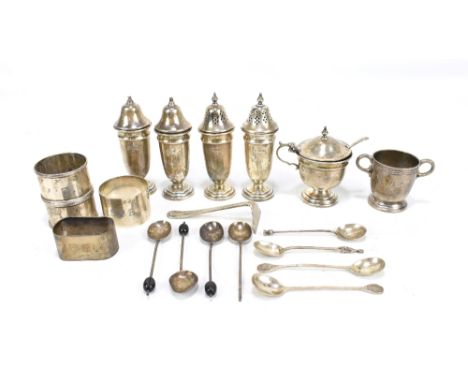 A group of variously hallmarked silver items including cruets, napkin rings and spoons, approx 14.0ozt/435g.Additional Inform