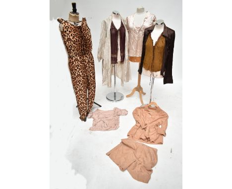 MARC JACOBS; a pink silk blouse, size US 8, a Roberto Cavalli brown satin and leather trim shirt, size US l, two Donna Karan 