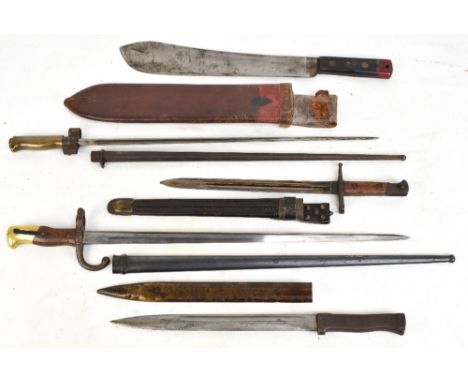 Four late 19th/early 20th century bayonets including a French example, signed 'Mre d' Armes de St. Etienne Juin 1876', blade 