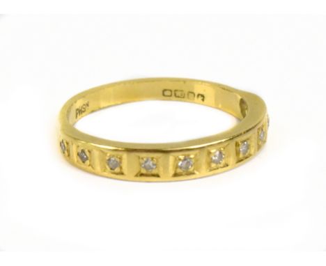 An 18ct yellow gold and diamond half eternity ring, size L 1/2, approx 2.5g.&nbsp;