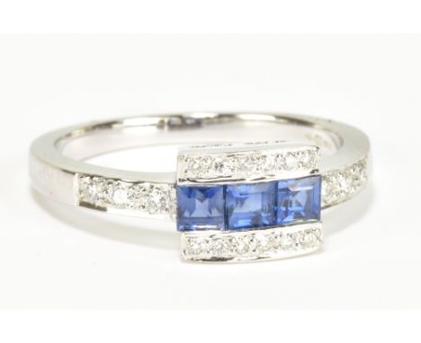 An 18ct white gold sapphire and diamond ring, size K, approx 3.4g.