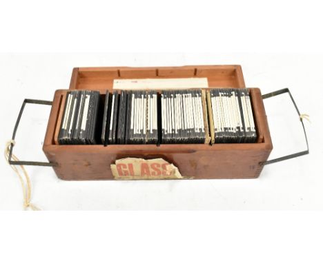 A group of magic lantern slides, majority annotated including 'St Mary's Hall Courtyard', 'Peeping Tom, Hartford St', 'Broadg