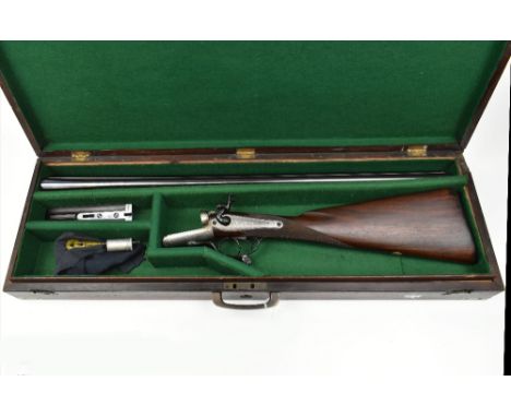 R. JONES; a 12 bore under lever hammer gun fitted with sleeved 28" barrels mounted with a smooth concave rib and 2 1/2" chamb