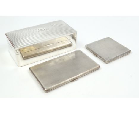 WH MANTON LTD; a George VI hallmarked silver rectangular engine turned cigarette case, engraved signature to interior 'A.H. Q