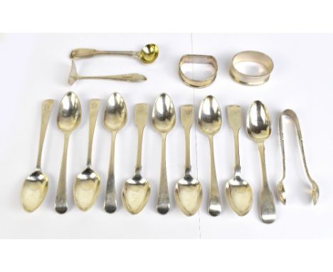 A group of variously hallmarked silver including teaspoons, cruet spoons, a pair of sugar tongs, a baby's feeder and two napk