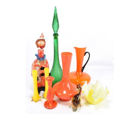 A group of art glass including yellow and clear glass cased pair of vases, orange ewer and vase, large green decanter, etc.