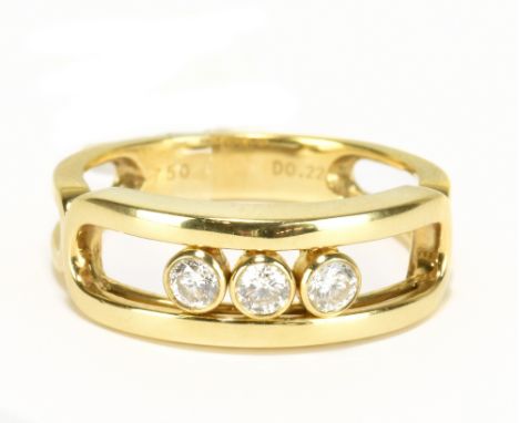MESSIKA OF PARIS; an 18ct yellow gold 'Move Classic' ring, with three diamonds weighing 0.22cts, size N, approx 4.6g.