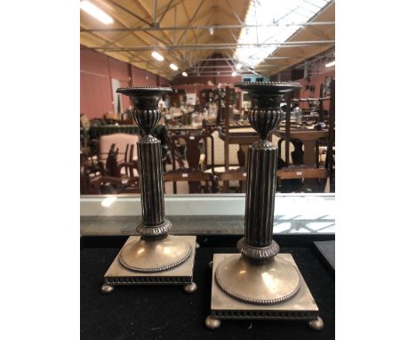 A pair of Swedish silver Corinthian column candlesticks, each raised on bun feet, impressed marks to foot rim, height 20cm, t