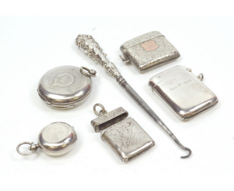 A group of variously hallmarked silver items comprising three vesta cases, one engraved 'Nov. 1st 1909' and one with initials