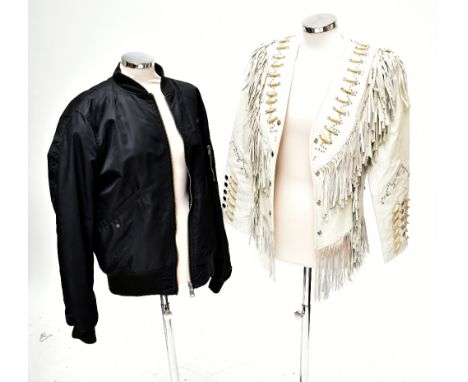 BOY LONDON; a black reversible bomber jacket with embroidered 'Boy' on back, size l, and a USA bikers cream fringed and studd