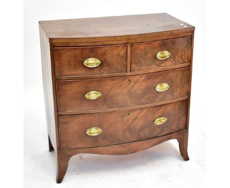 A Georgian mahogany bowfronted chest of two short over two long drawers, raised on bracket feet.Additional InformationHeight 