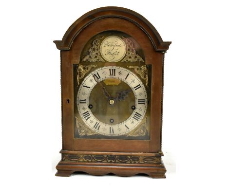 DENT OF LONDON; a 20th century mahogany cased 'Tempus Fugit' bracket clock, the brass bell with applied cherub masks, the sil