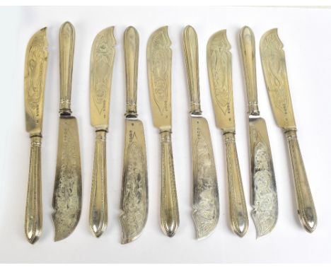 GEORGE ADAMS (CHAWNER &amp; CO); a set of nine Victorian hallmarked silver bladed and silver sheath handled fish knives, each