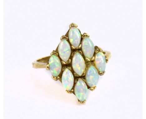 A 9ct yellow gold and opal dress ring size O 1/2 approximately 3.5g.Additional InformationPostage would be an extra small box