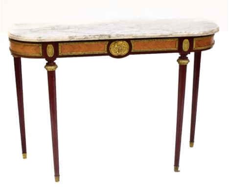 A reproduction French mahogany and kingwood inlaid oval console table with marble top and gilt metal mounts on tapered legs.&