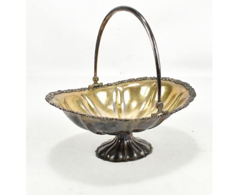 A Finnish silver swing handled bowl, with cast scroll handle, with gilt interior, impressed marks for Helsinki, approx weight