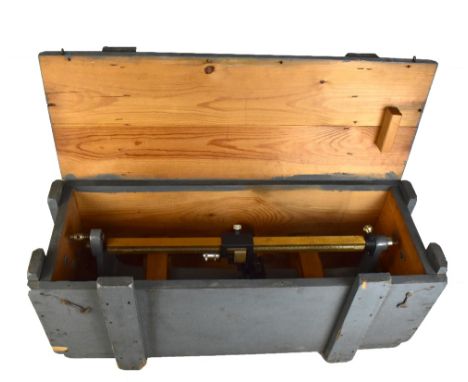 THE PRECISION TOOL INSTRUMENT CO LTD OF SURREY, ENGLAND; a metal theodolite, inset within pine carrying case.