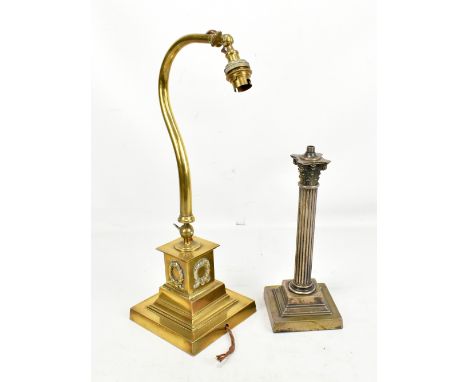 An early 20th century brass adjustable table lamp on square plinth base with relief rococo style decoration, height 46cm, and