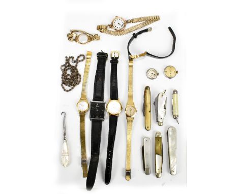 A group of ladies' vintage wristwatches including a 9ct gold example, also a collection of pocket knives, button hooks, etc.