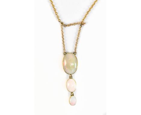 A 9ct yellow gold graduated three stone opal necklace, length 41cm, approx 4.8g.