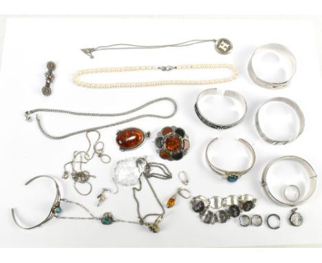 A quantity of predominantly silver jewellery including a snap bangle, various other bangles, a Scottish hardstone set brooch,