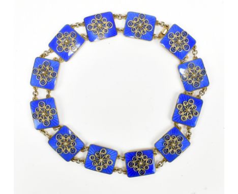 A Norwegian sterling silver blue enamel filigree decorated necklace formed of twelve rectangular panels.Additional Informatio