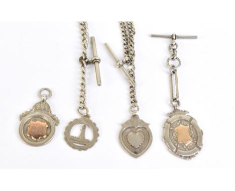 Two hallmarked silver Albert chains, three fob medals, one inscribed 'M&amp;D S.S.F.L. 1921', and initialled 'HM' to the reve