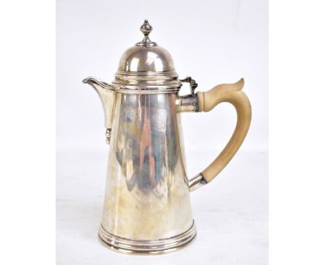 CJ VANDER LTD; an Elizabeth II hallmarked silver coffee pot with cast finial of tapered form, London 1966, height 25cm, appro