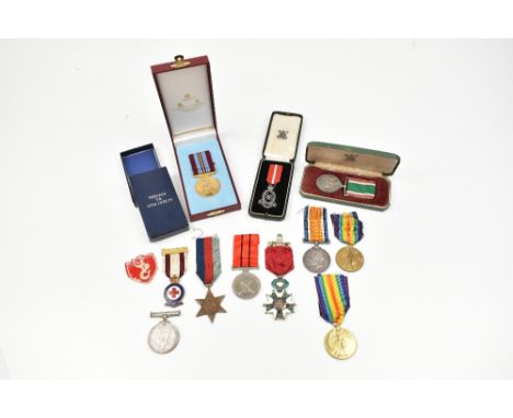 A mixed group of medals including WWI War and Victory duo awarded to 202229 Pte. J. Shaw Cheshire Regiment, a single Victory 