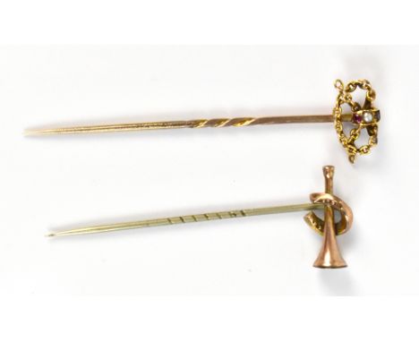 A yellow metal stick pin with knot terminal and a further stick pin with a hunting horn, af.Additional InformationThe hunting