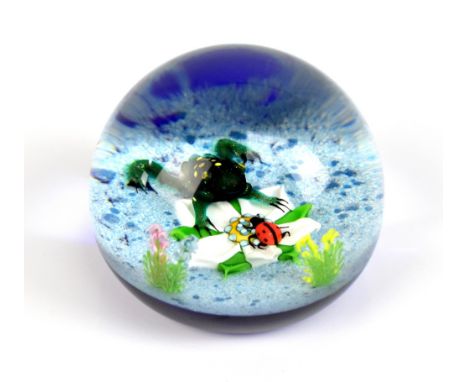 WILLIAM MANSON FOR CAITHNESS; a 'Frog &amp; Ladybird' glass paperweight, 84/150, diameter 7cm.