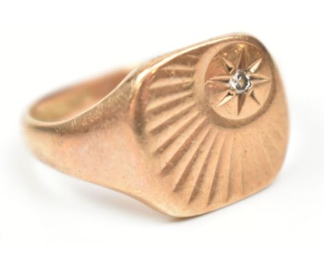 A 9ct yellow gold gentleman's signet ring set with tiny diamond to the square section platform, size Q, approx 6g (af).Additi