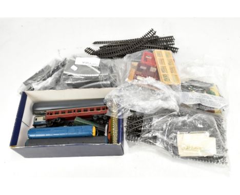 A group of playworn toys to include Tri-ang R357 diesel engine, track architecture and track.