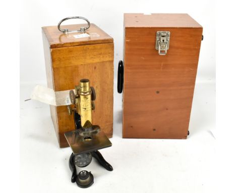 LEITZ; a black lacquered and brass monocular microscope, no.138798, boxed, and a further box for a microscope (3).